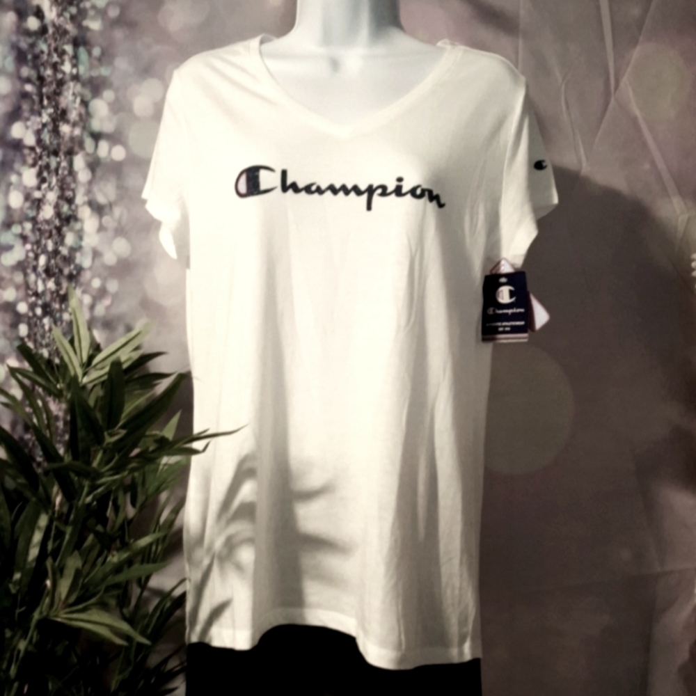 Champions woman's T-shirt. Red white and blue logo